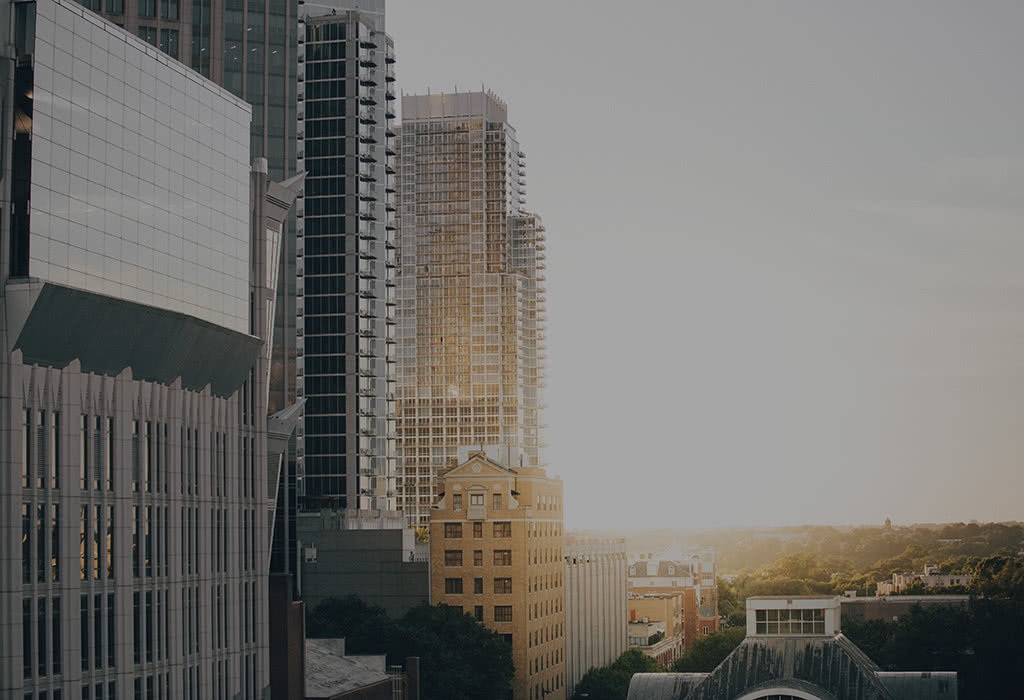 Morning Sunrise Behind Tall Skyscrapers